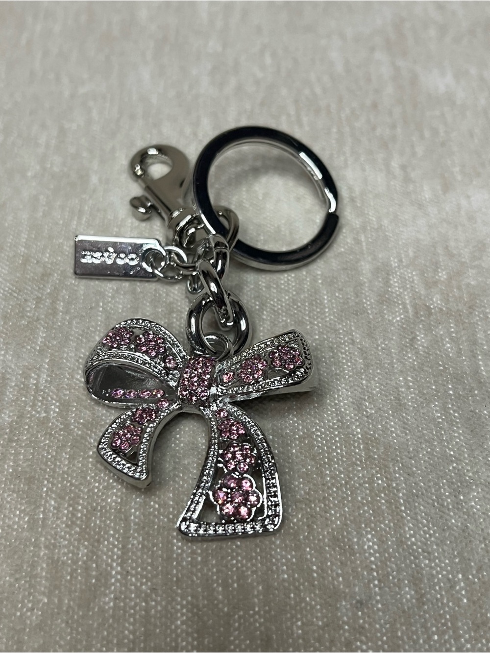 Coach Silver-Tone Bow Keyring with Pink Crystals